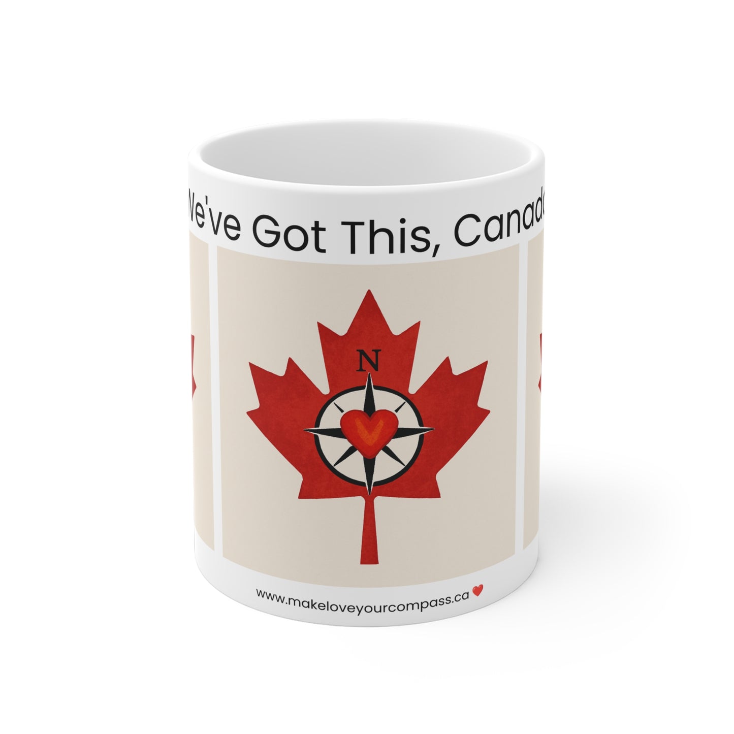 White ceramic mug with red maple leaf and compass heart design. Text reads “We’ve Got This, Canada.” Canadian-themed mug by Make Love Your Compass™.