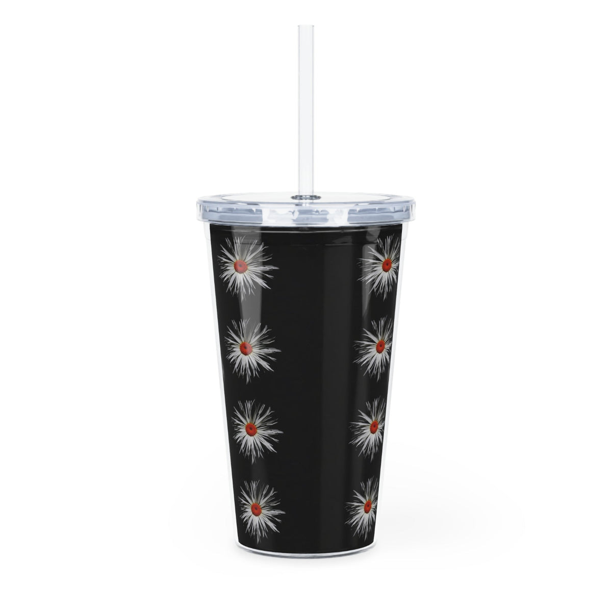 Black tumbler with white floral designs and a straw on a white background