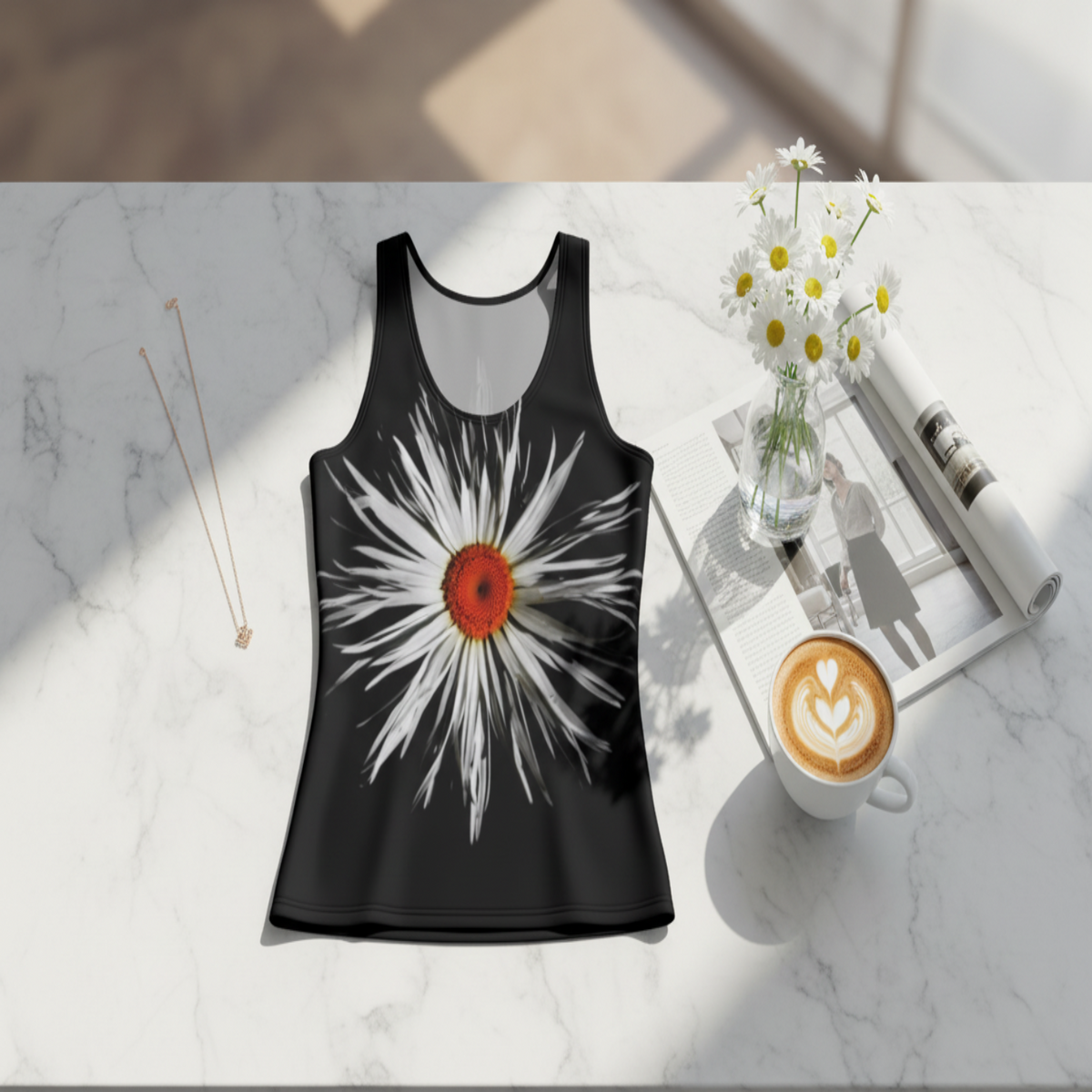 Black tank top with a white flower design on a gray background
