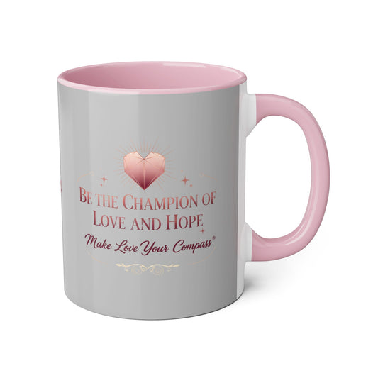 Gray mug with pink interior and handle, featuring a heart design and motivational quote.