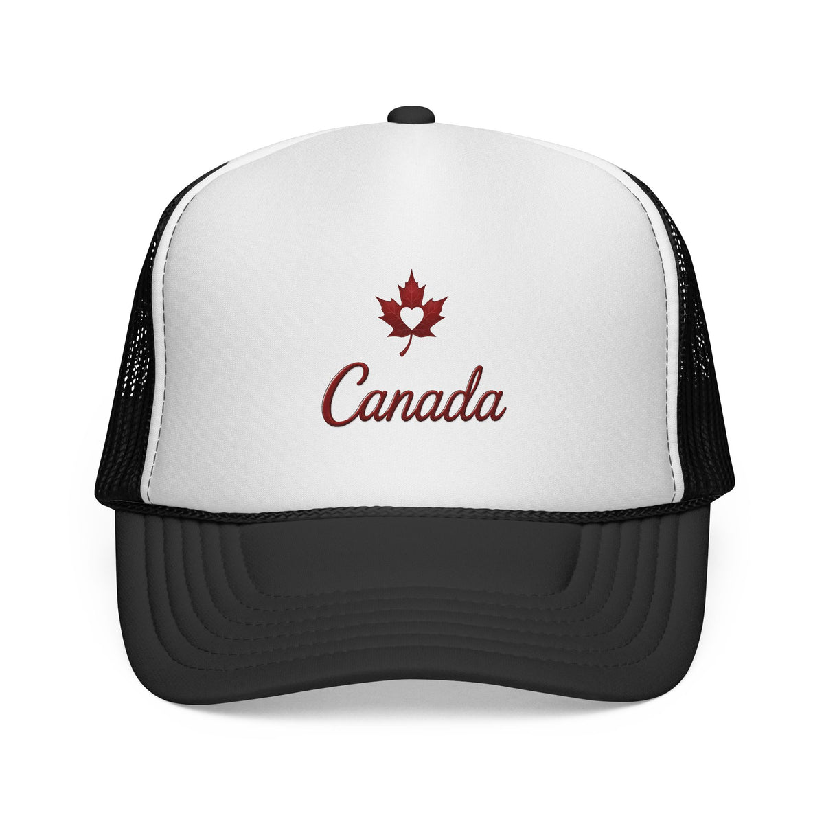 A black and white trucker hat featuring a red maple leaf and the word 'Canada' printed on the front white panel.