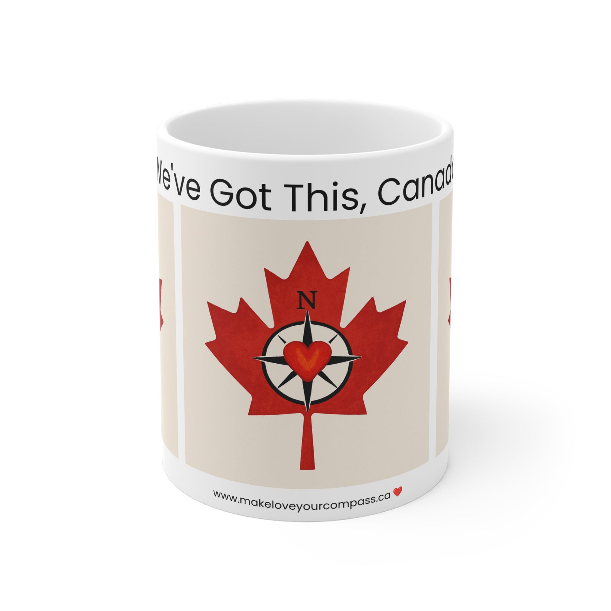 White ceramic mug with red maple leaf and compass heart design. Text reads “We’ve Got This, Canada.” Canadian-themed mug by Make Love Your Compass™.