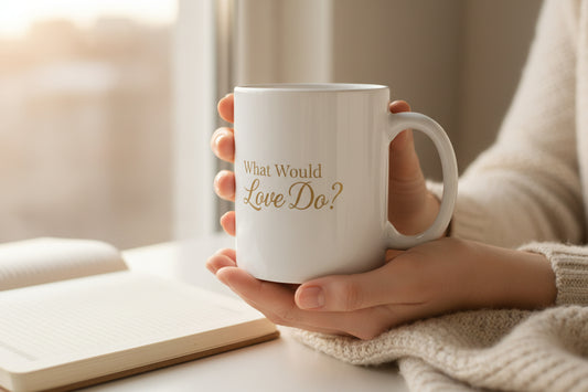 White mug with gold text on a white background