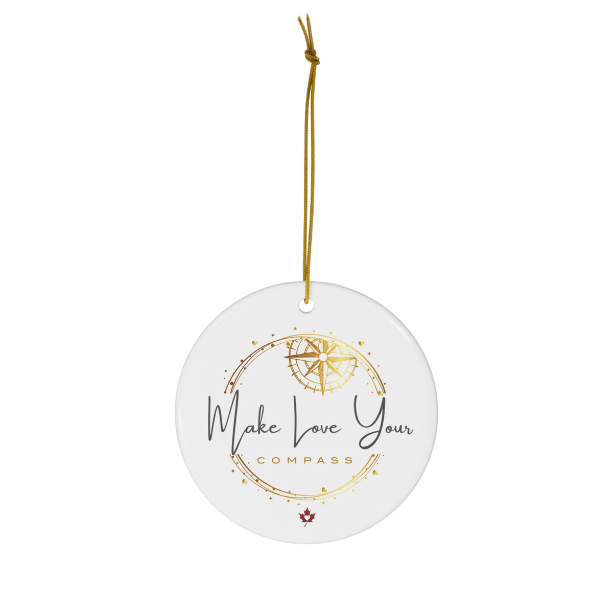 Make Love Your Compass ceramic Christmas ornament, featuring the official Make Love Your Compass trademark logo and a delicate small maple heart motif on a white ceramic background.
