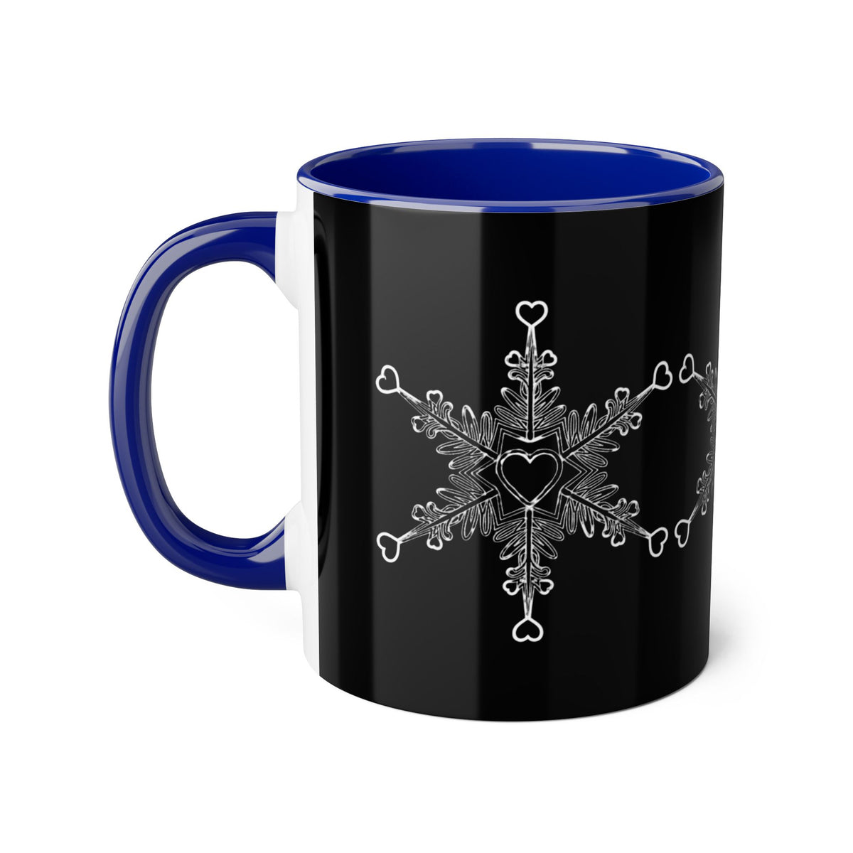 Make Love Your Compass 11oz ceramic accent mug with a black exterior and vibrant blue interior and handle, featuring a white snowflake design made of tiny hearts.