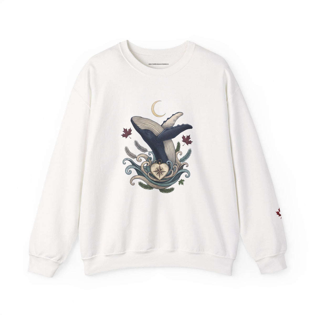 Make Love Your Compass Whale Moon Sweatshirt: A white crewneck featuring a graphic print of a blue and white whale with a crescent moon and swirling waves against a white background.