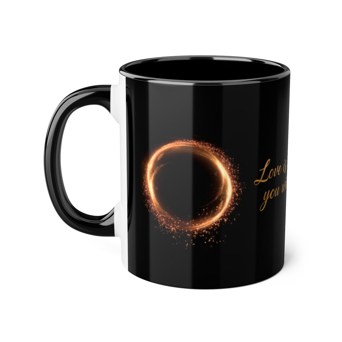A glossy black ceramic mug with a gold glittery ring design and gold cursive text on the side, shown on a plain white background.