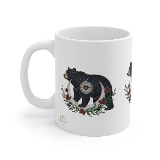 A left-handed side view of a white ceramic black bear mug featuring a small trademark logo in the bottom corner.