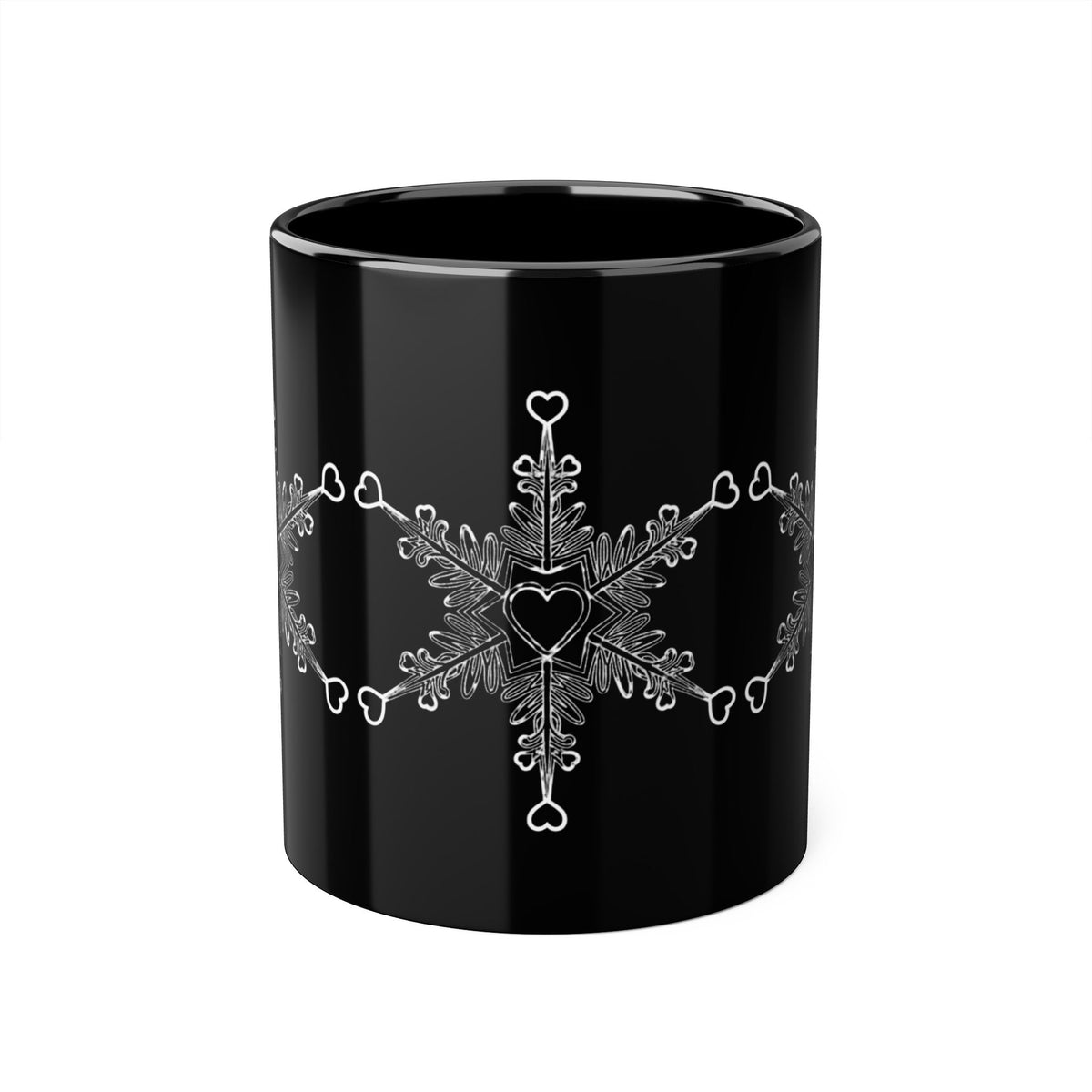 Make Love Your Compass 11oz ceramic accent mug with a sleek black exterior and interior, featuring a delicate white snowflake made of tiny hearts.