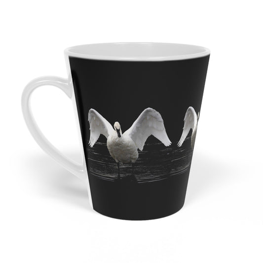 Black mug with a white swan design on a white background