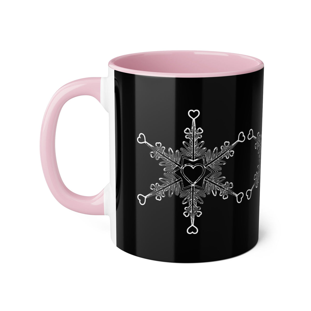 Make Love Your Compass 11oz ceramic accent mug with a black exterior and soft pink interior and handle, featuring a white snowflake design made of tiny hearts.