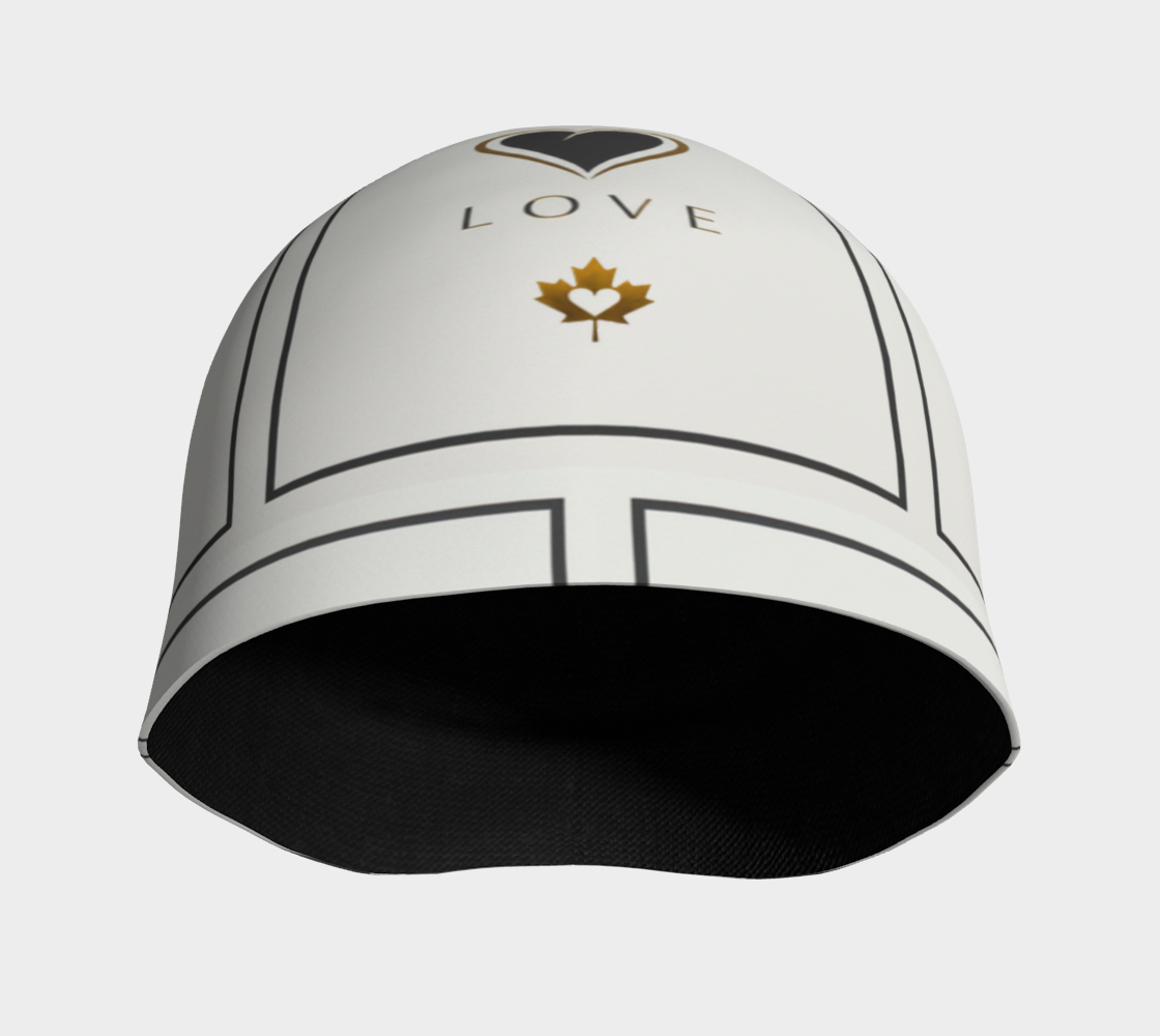 White beanie with black text and a gold maple leaf design on a white background