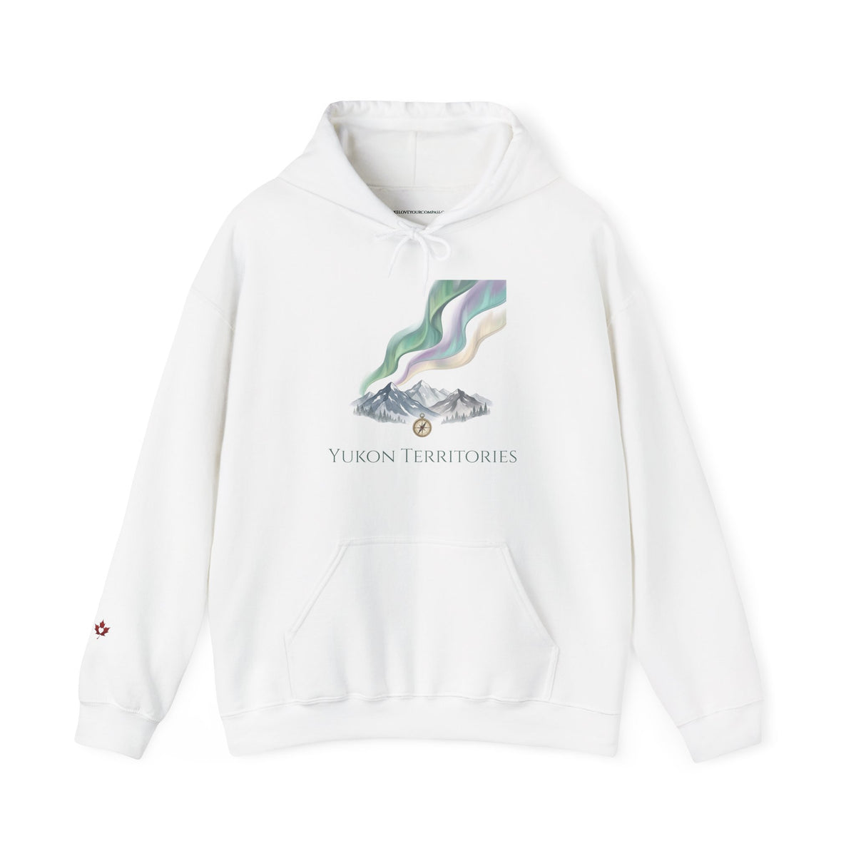 A white pullover hoodie featuring a graphic print of the Yukon Territories flag above stylized mountains, with 'YUKON TERRITORIES' text printed below. The hoodie has a drawstring hood, a kangaroo pocket, and a small red maple leaf graphic on the left sleeve.