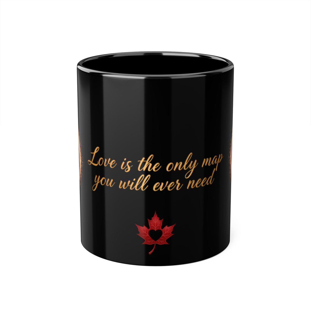 A glossy black ceramic mug featuring the phrase 'Love is the only map you will ever need' in gold cursive script and a red maple leaf with a heart inside near the bottom, shown on a plain white background.