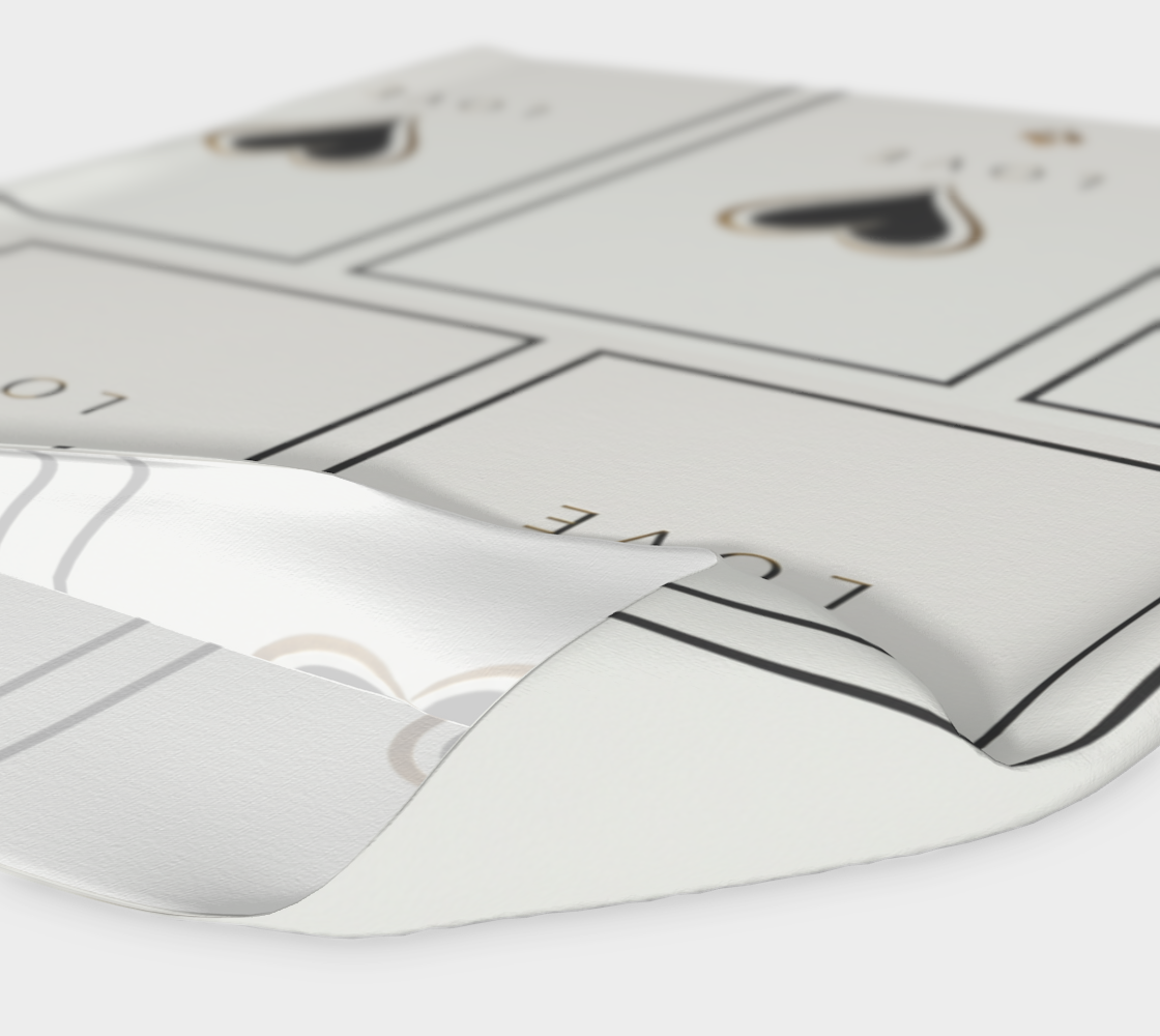 Close-up of a white electronic device with black text on a white background